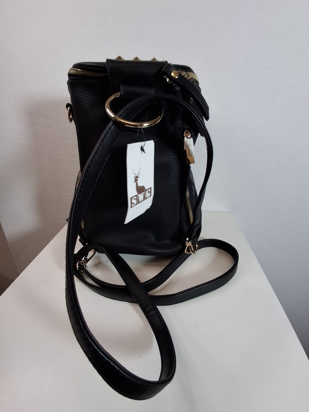 SWG Black Pebbled Sling Barrel Backpack with Gold Accents - Picture 3 of 11